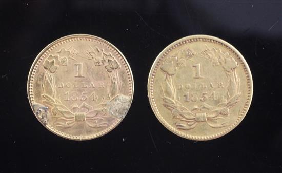 Two United States of America one dollar gold coins, 3.3g (total)